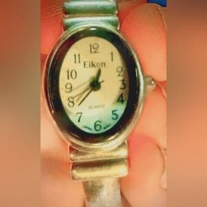 Vintage Ladies Oval Eikon, Quartz w/Silver Toned Cuff, Open Band, Japan Movement